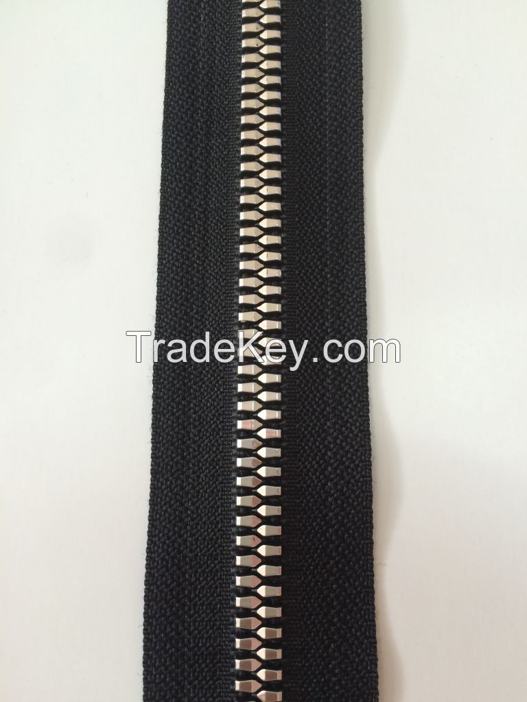 Injection molded zipper with special teeth and hanging plating