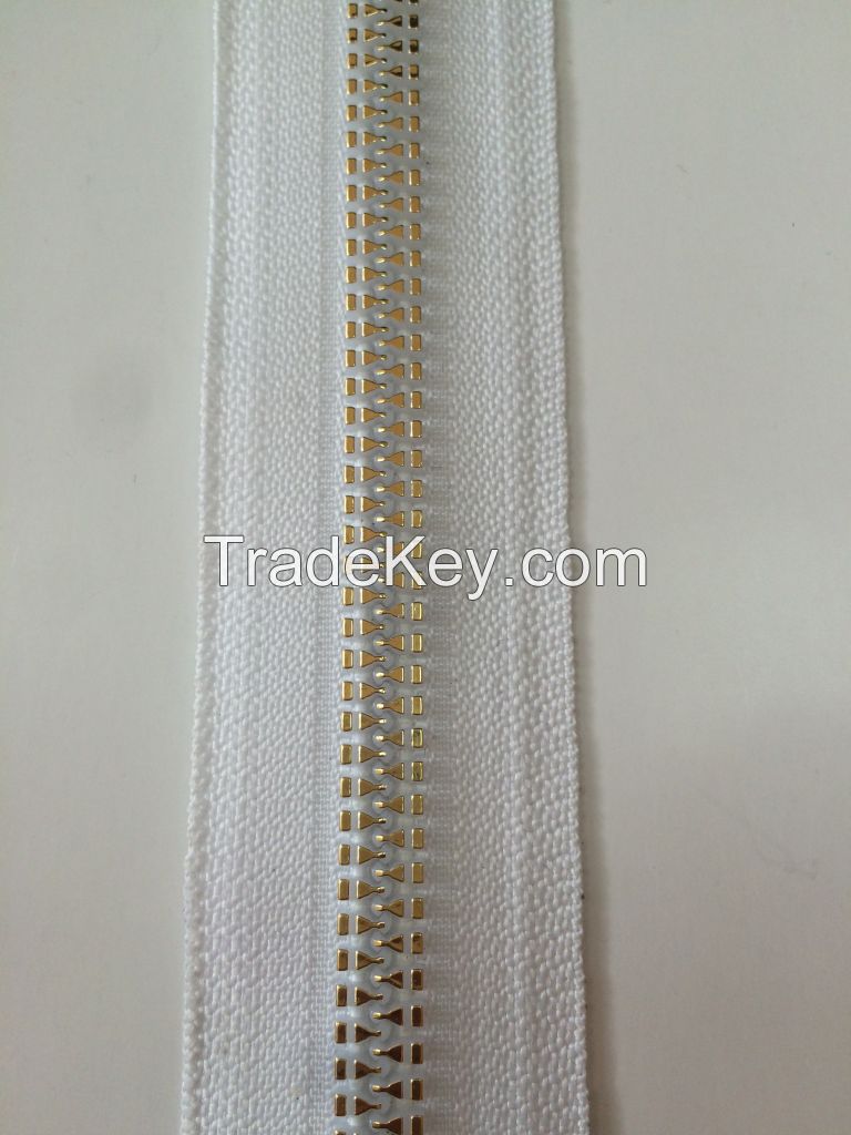 Injection molded zipper with special teeth and hanging plating tech