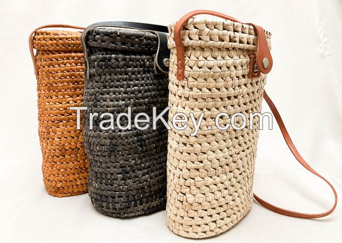 Handmade raffia wine carrier