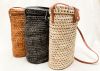 Handmade raffia wine carrier