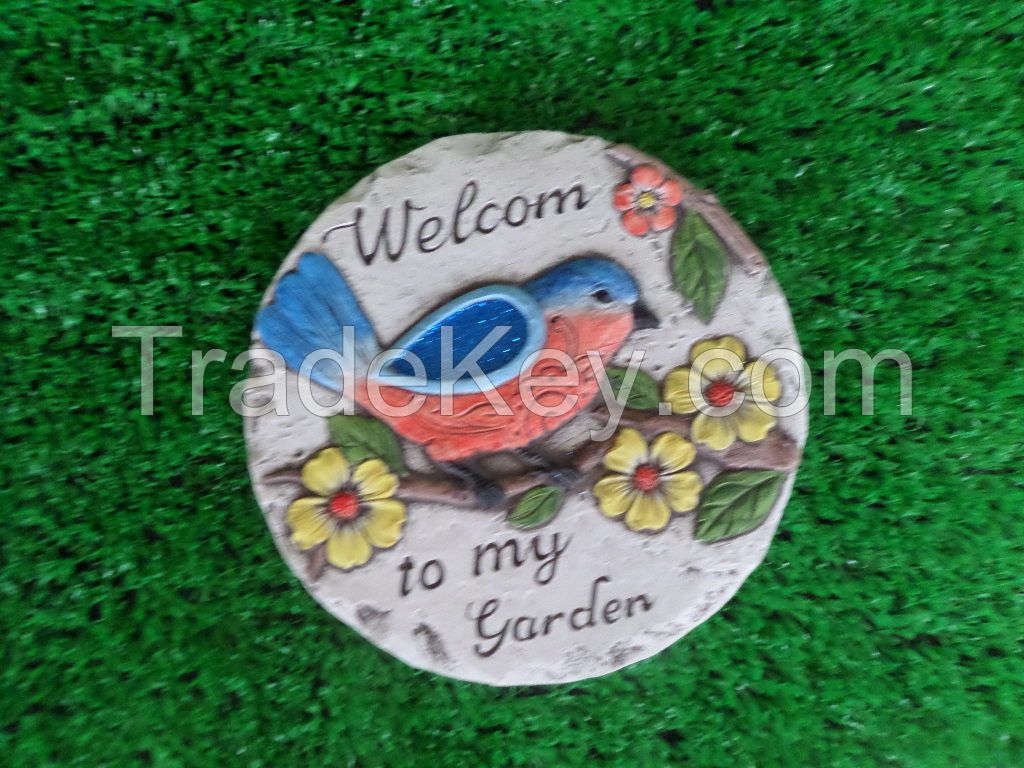 Cement floor tiles in garden embossed flower and birds