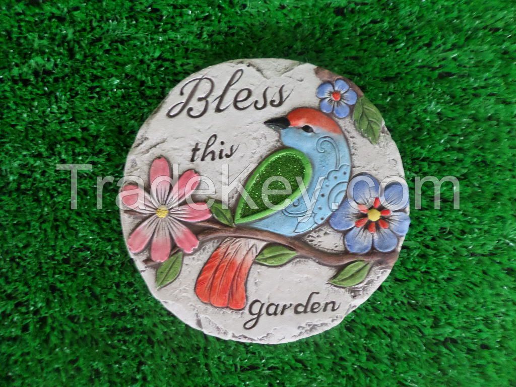 Cement floor tiles in garden embossed flower and birds