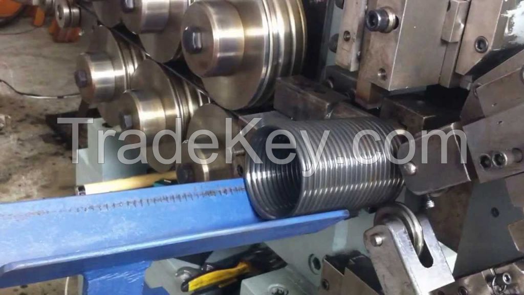 Spring making machine