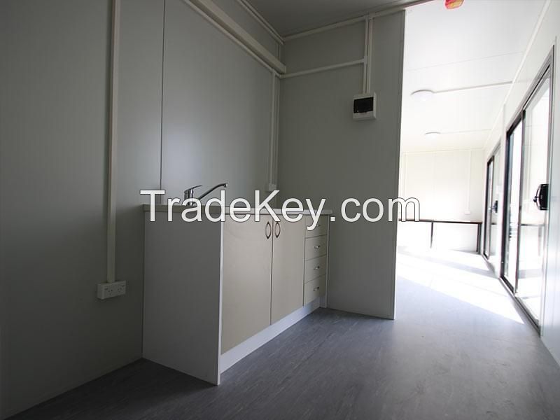 Customized 40ft High Cube Office shipping featuring sliding glass doors & window, insulated, AC unit and restroom