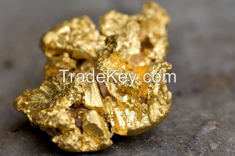 Raw Gold Nuggets and Gold Bars