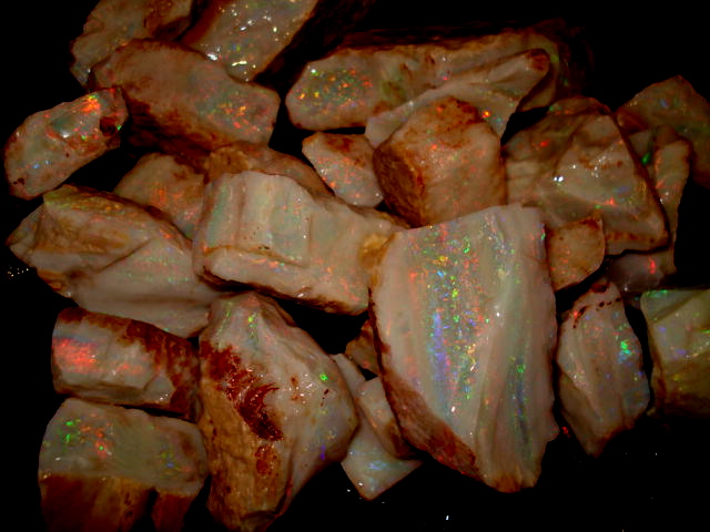 large rough / cut precious opal parcels.