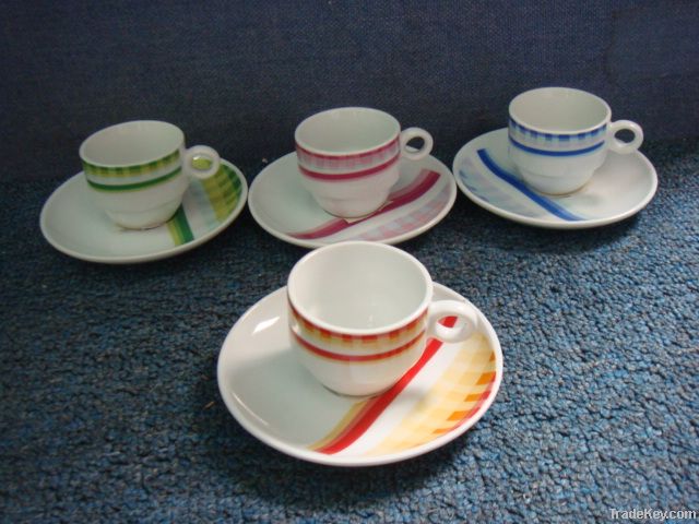 Porcelain cup and saucer with fruit design