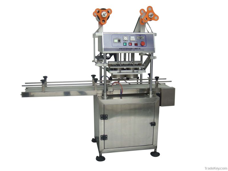 Plastic bottle sealing machine