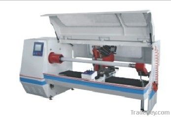 Single shaft auto roll cutting machine