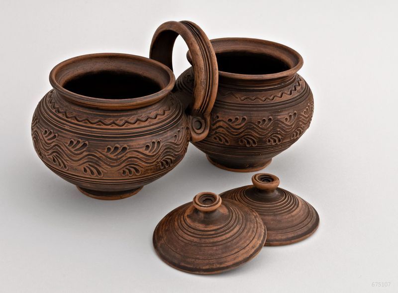 Ceramic pot set of two pots made of red clay. 