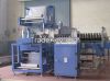 Shrink wrapping machine