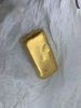 Gold bar and dust