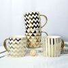 Gold Handle Coffee Mug...
