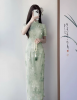 Green cheongsam improv...