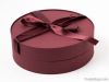 Round burgundy jewelry...