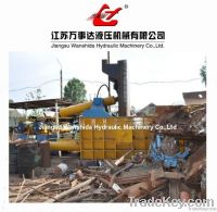 Hydraulic scrap metal compactor