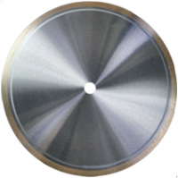 Chip free cutting continuous rim blade for ceramic tile