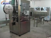 automatic sleeve labeling machine