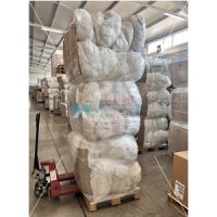 Disposable incontinence bed pads in compressed bales - Supply UP01 (EU)