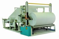 The jumbo roll paper rewinding cutting machine