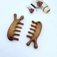 NATURAL MASSAGE COMB WITH TERMINALIA CATAPPA