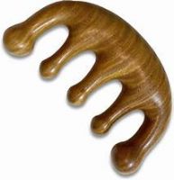 NATURAL WOODEN COMB INFUSED WITH PLANT