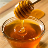 GOLDEN NATURAL HONEY FOR COOKING HEALTH