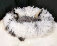 Dog beds. Animal sheepskin lair