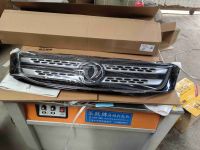 6121009AA Radiator Grill (with Logo