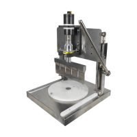 Ultrasonic hand pressure cutting machine. 