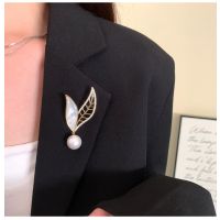 mother of pearl brooches