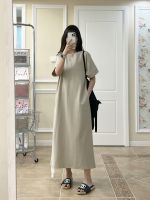 Casual straight short-sleeved T-shirt dress for women. In the summer of 2025, it features a lazy and solid color style, rolled-up sleeves, and a simple and long dress design.
