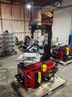 Tire Changer With Rear-Tilting Auxiliary