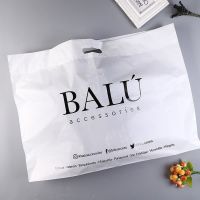 Reusable plastic die cut patch handle shopping carrier bags