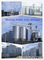 Grain steel silo with elevator