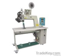 Seam sealing machine