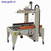 Automatic Carton Sealer (Bottm-Side Belts Driven)