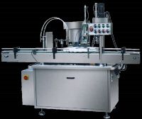 EYE DROP LIQUID FILLING, STOPPERING AND CAP-SCREWING MACHINE