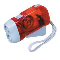 Hand press flashlight