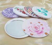 Round plastic pocket mirror with slide cover