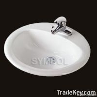 Ceramic self-rimming sinks