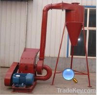 Blower style hammer mill