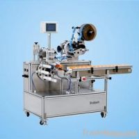 Automatic horizontal tube labeling machine