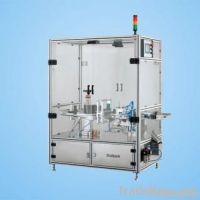 Full-automatic lipstick bottom labeling machine