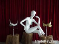 sitting female mannequin