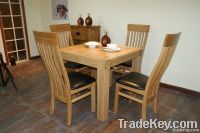 solid oak dining table and chairs