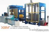 Concrete brick making machine