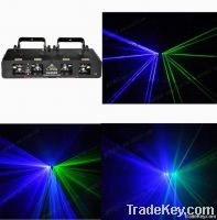 green and blue four head laser light