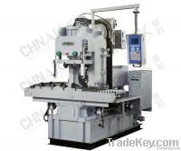 vertical injection molding machine