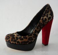 leopard closed toe platform pumps